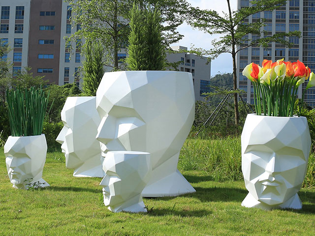 商場(chǎng)玻璃鋼人臉?biāo)囆g(shù)花盆 商場(chǎng)玻璃鋼人臉?biāo)囆g(shù)花盆